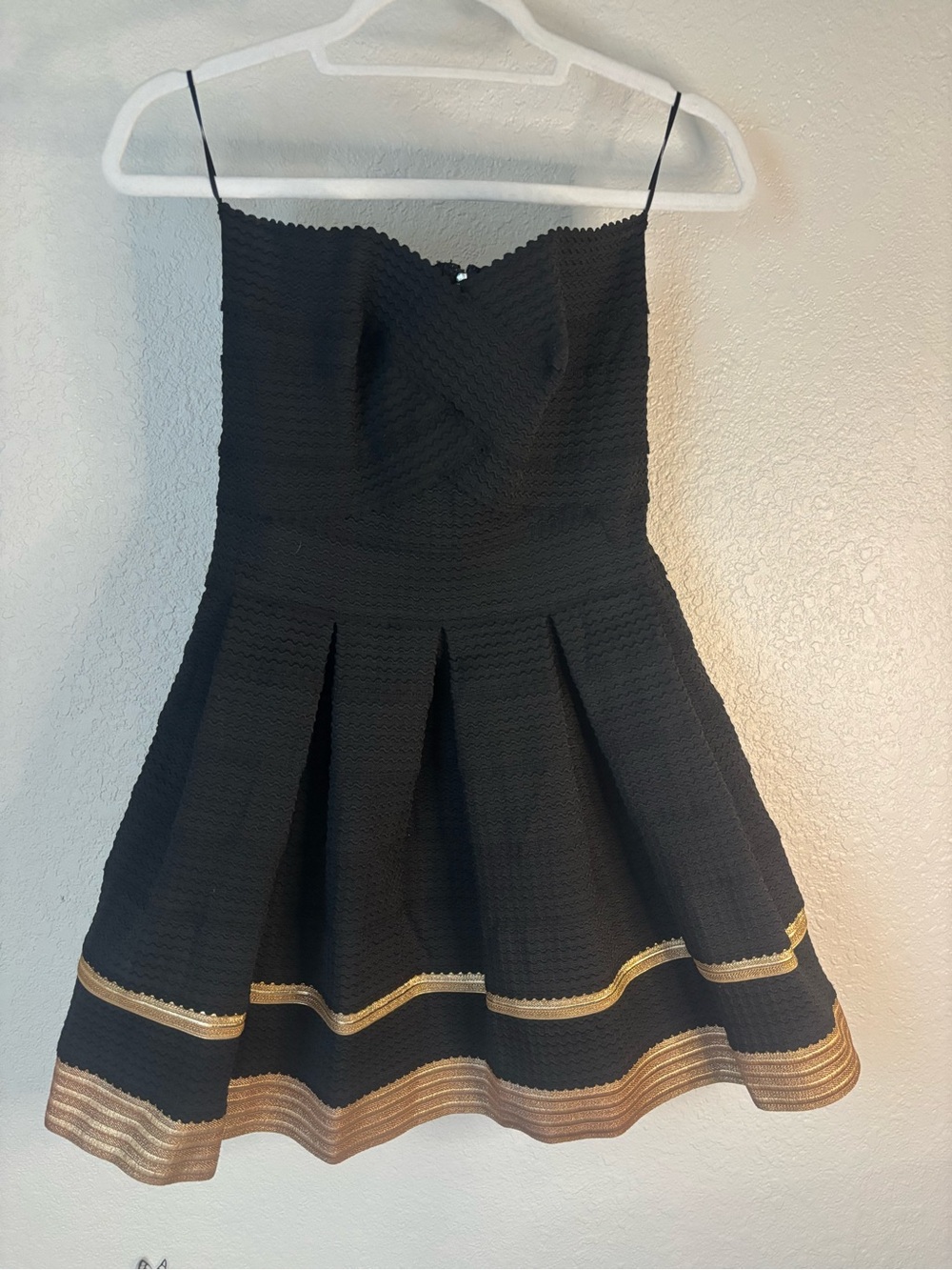 Black Mini Fit-and-Flare Dress with Gold Hem Detail